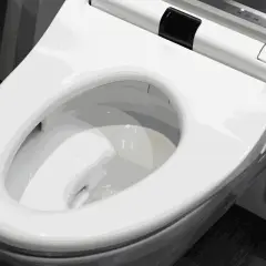 Nowoczesna, biała deska sedesowa z panelem sterowania. Dowiedz się, jak zmierzyć deskę sedesową, by idealnie pasowała.