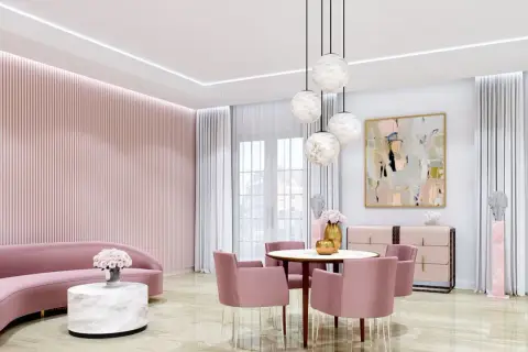 Elegancki salon w odcieniach różu z sofą, okrągłym stolikiem kawowym z blatem imitującym alabaster i krzesłami.