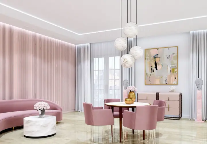 Elegancki salon w odcieniach różu z sofą, okrągłym stolikiem kawowym z blatem imitującym alabaster i krzesłami.